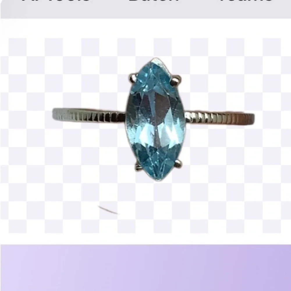 Sterling silver blue topaz ring